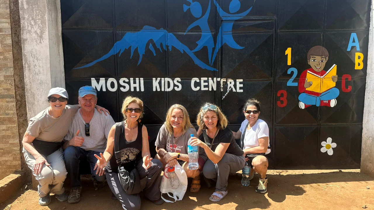 Volunteers with children at the Moshi Kids Centre in Tanzania