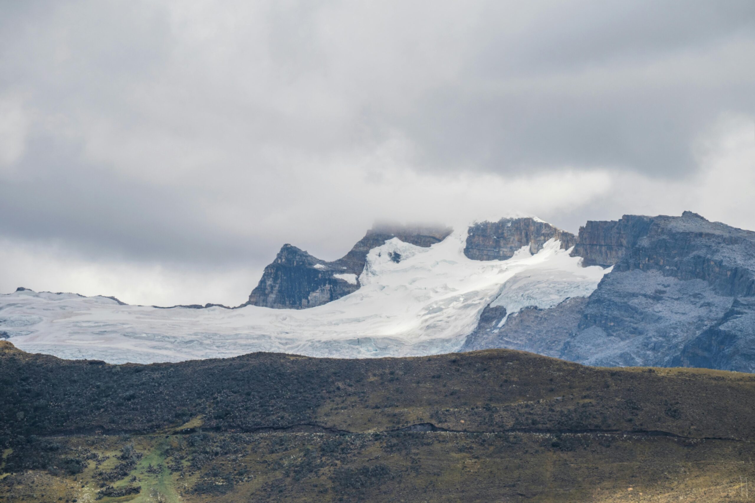 Volunteers using mobile apps to find local volunteering opportunities in Tanzania near Mount Kilimanjaro