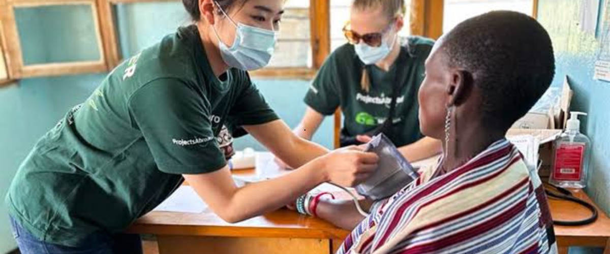 Students gaining hands-on internship experience in a clinic in Tanzania